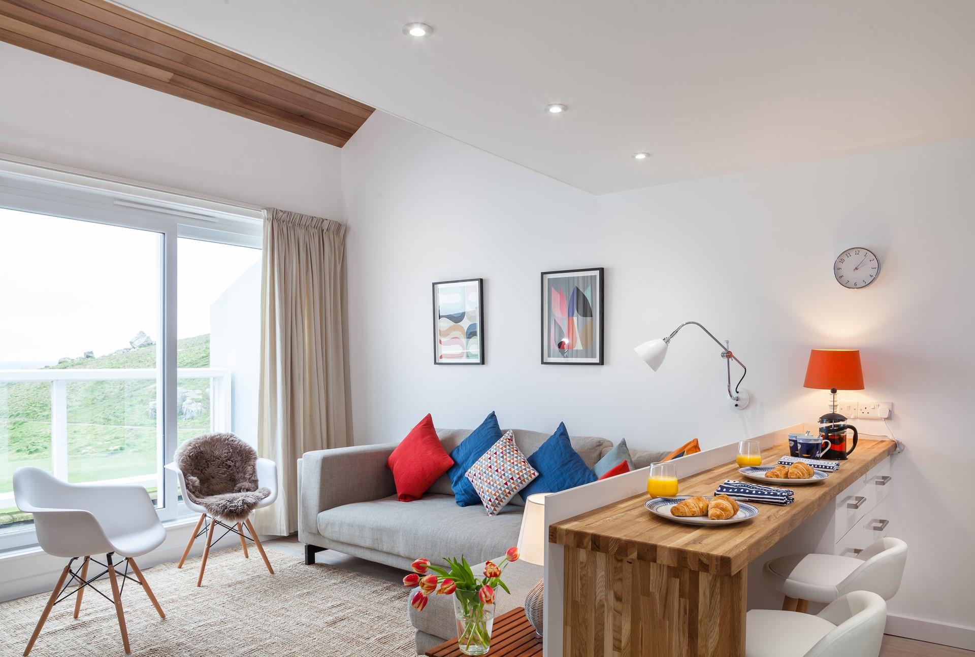 The open plan living area creates a spacious base to come back to.