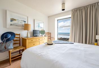 Wake up to the view of the sun rising over Porthmeor beach.
