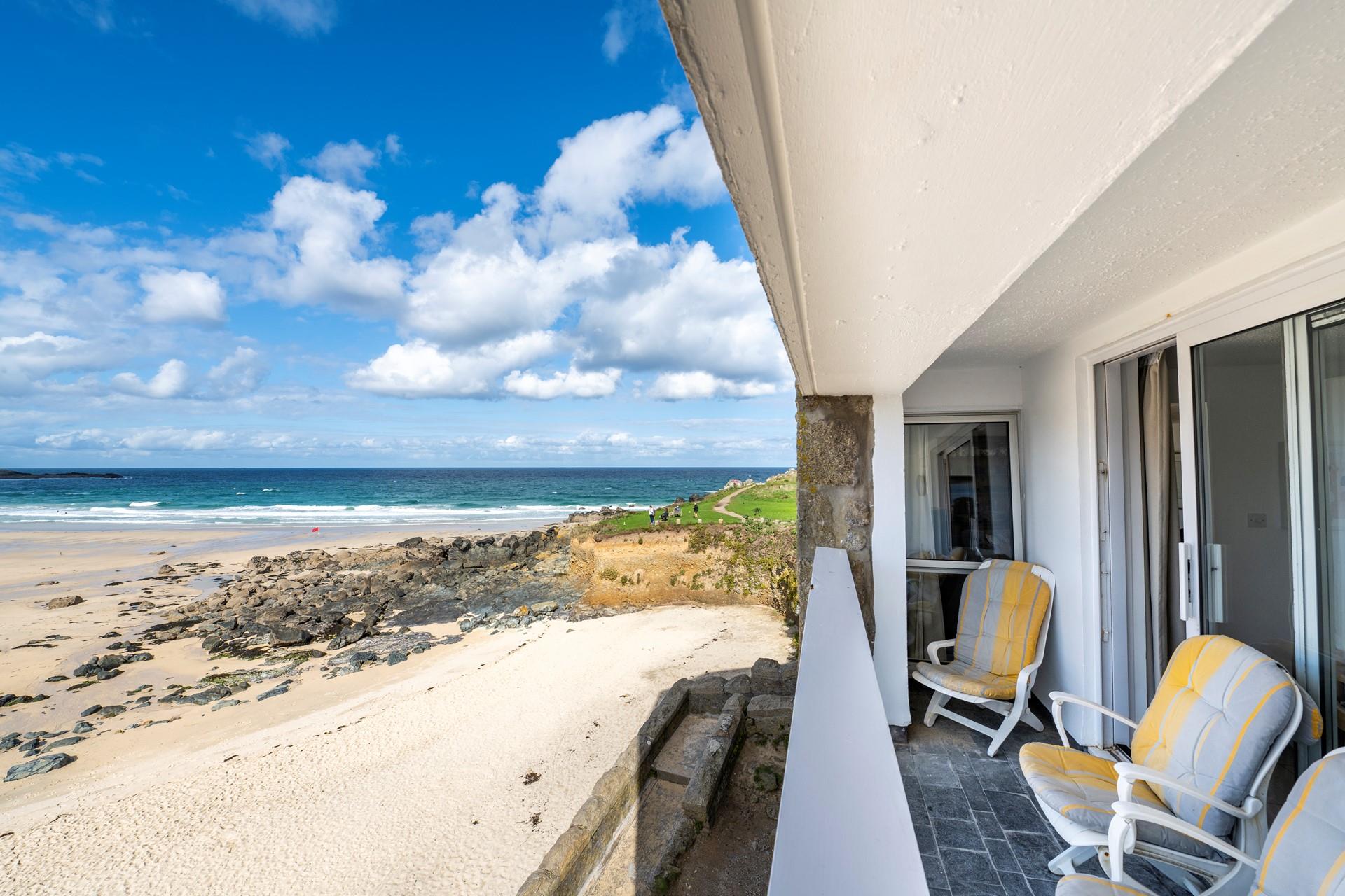Sit out on your balcony with a glass of wine.
