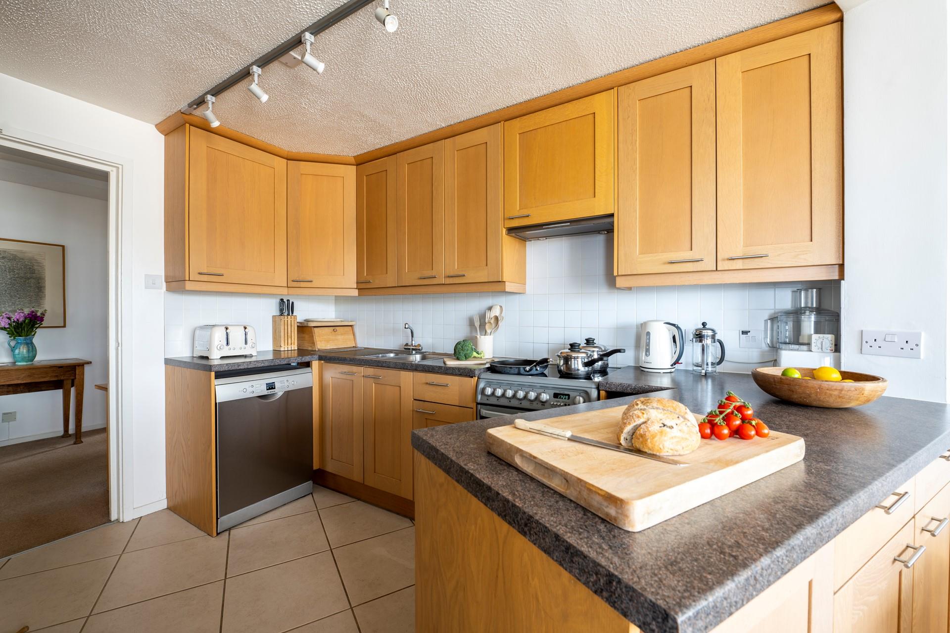 Cook up a storm in the well-equipped kitchen.