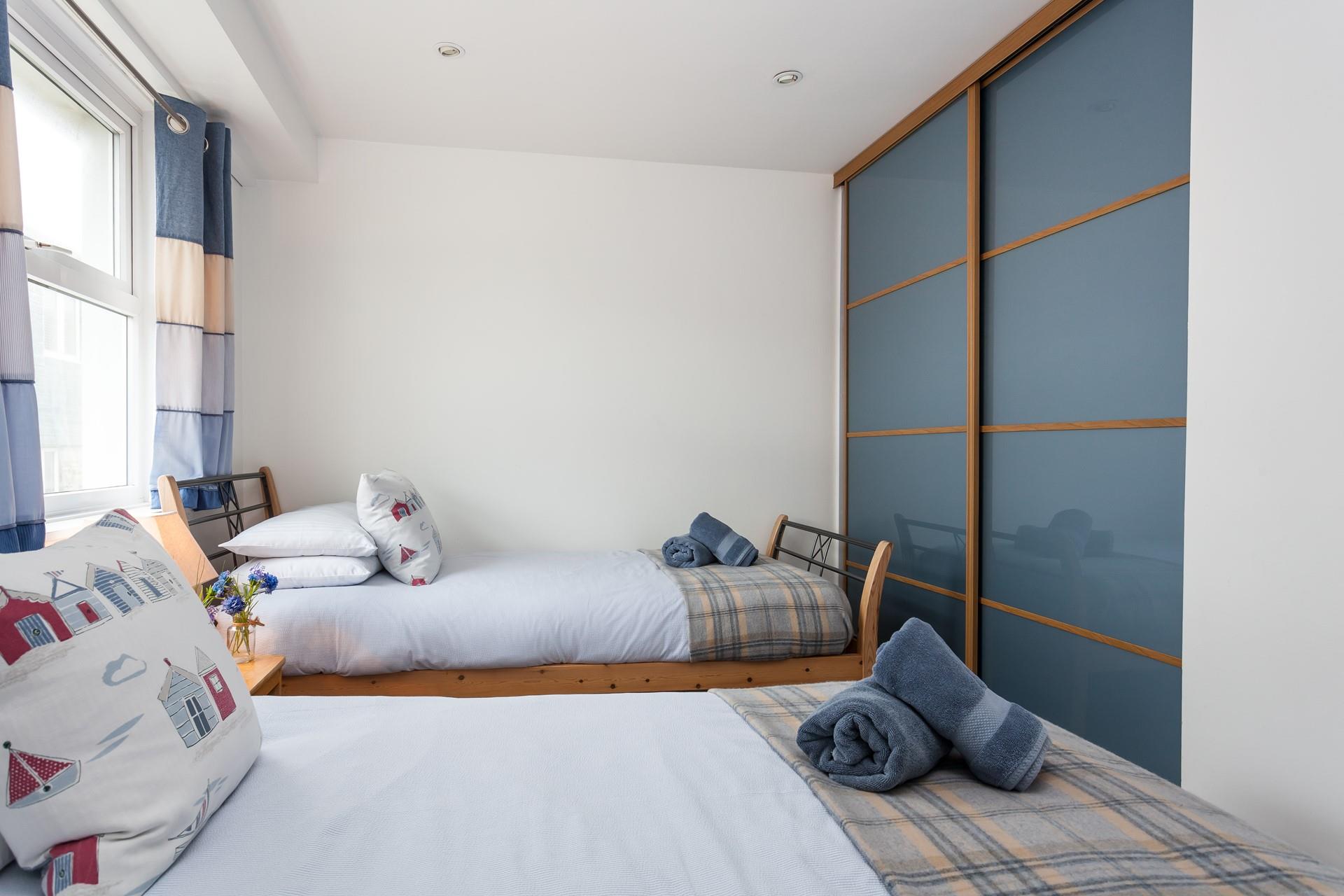 The twin bed provides a space for the kids to drift off to sleep.