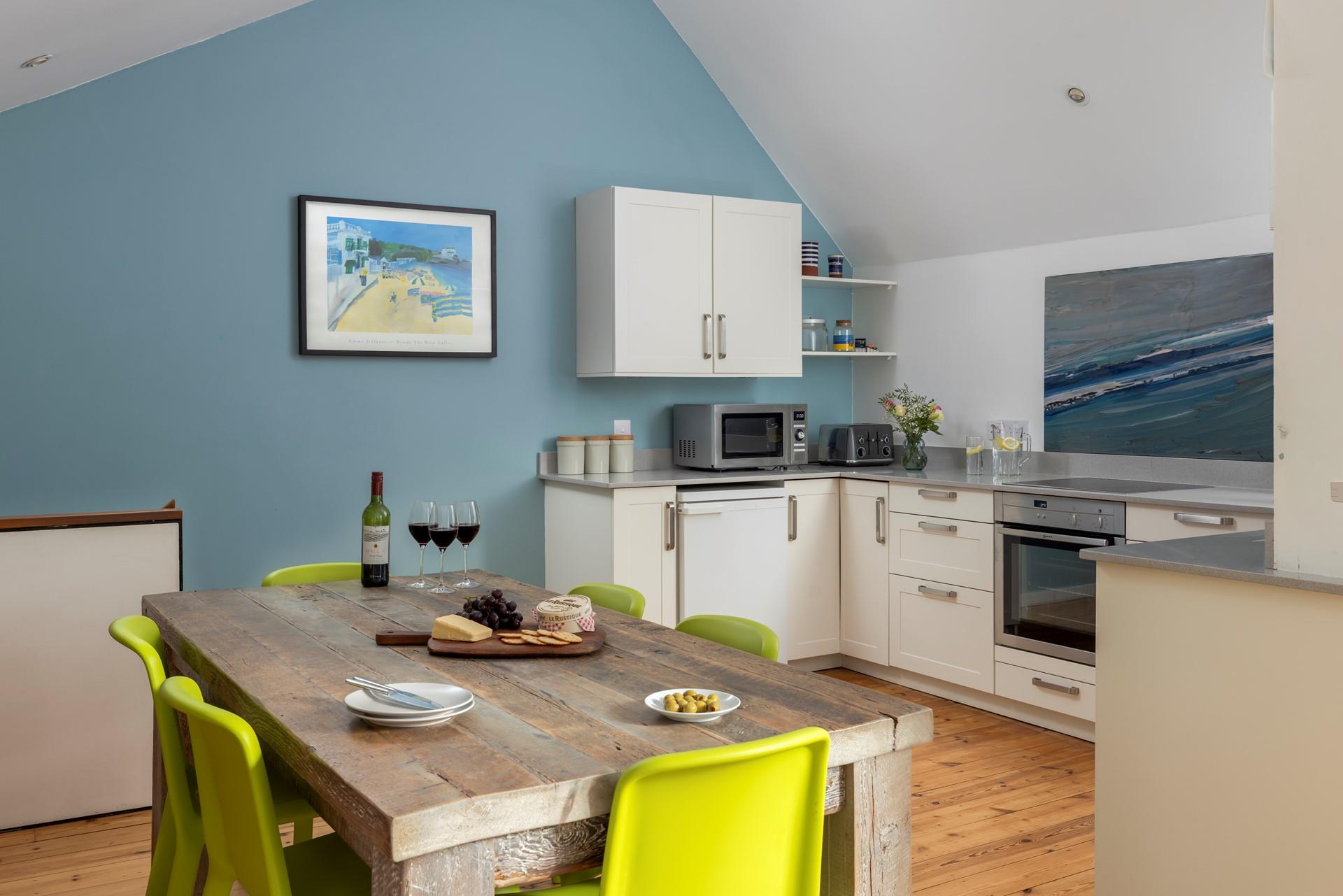 Sit around the stylish dining table and enjoy a delicious home cooked meal.