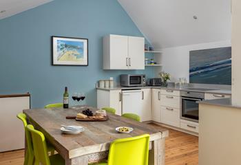 Sit around the stylish dining table and enjoy a delicious home cooked meal.