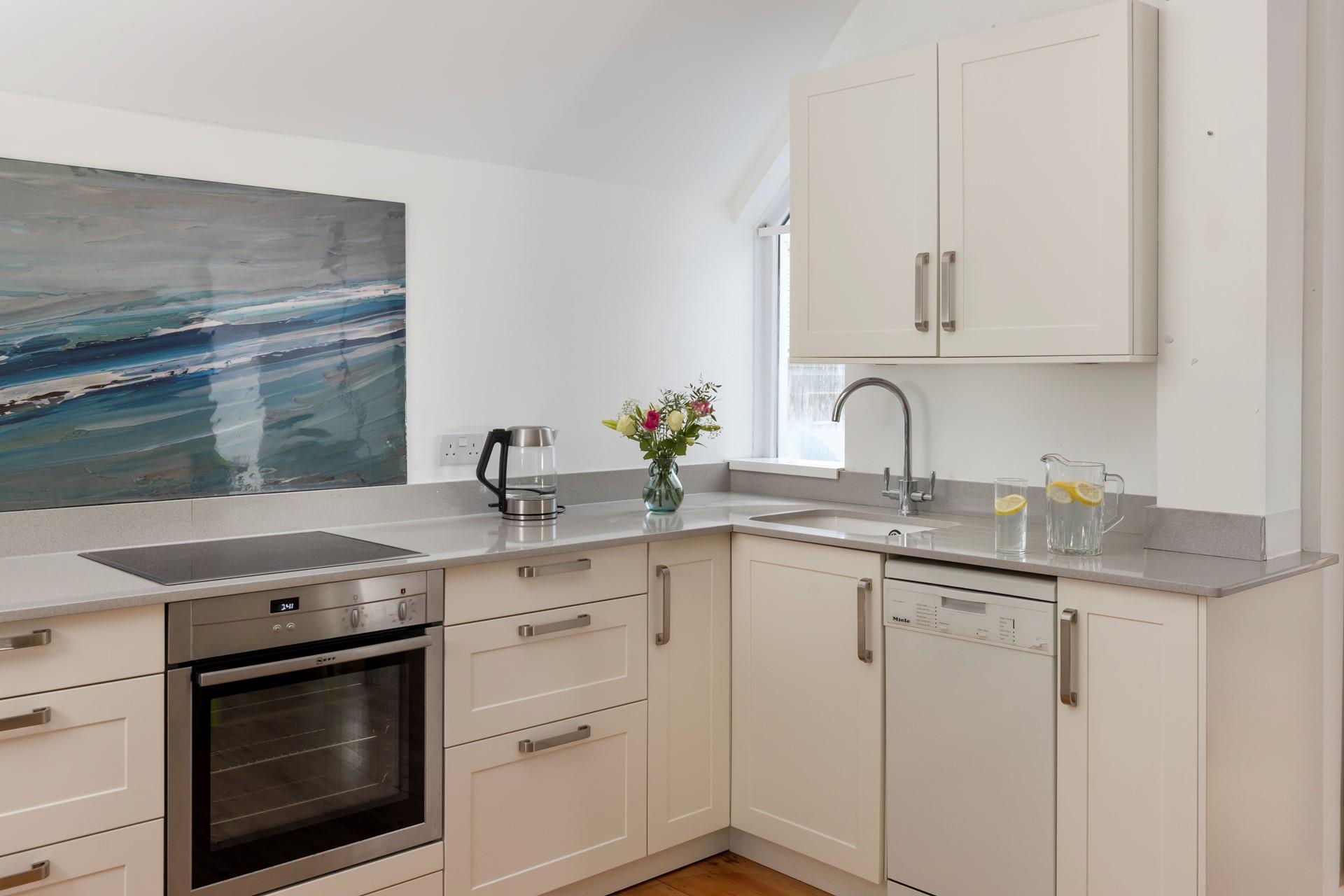 The kitchen is modern and well equipped for cooking up a storm!