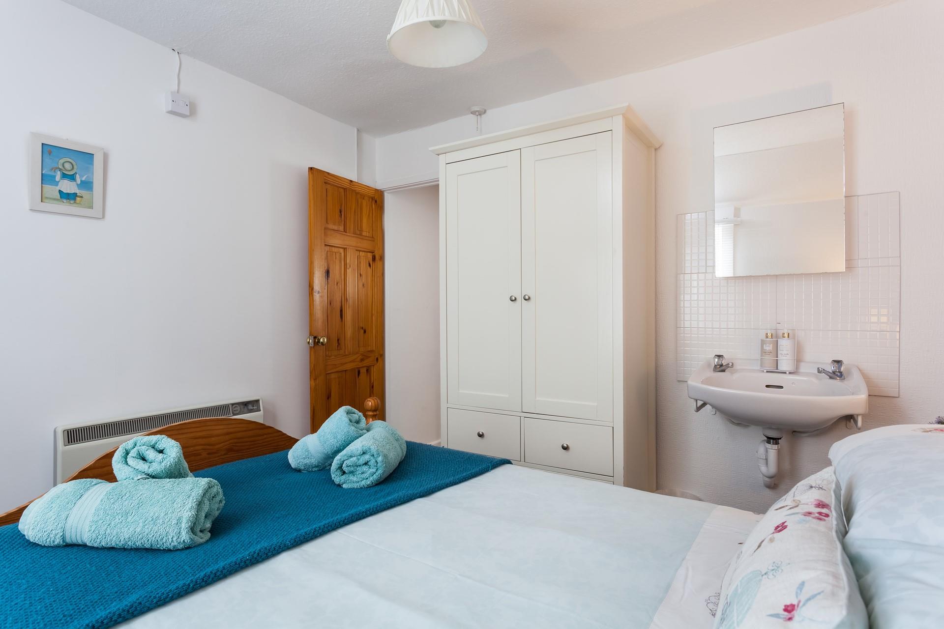 Fluffy towels await you in bedroom 1.