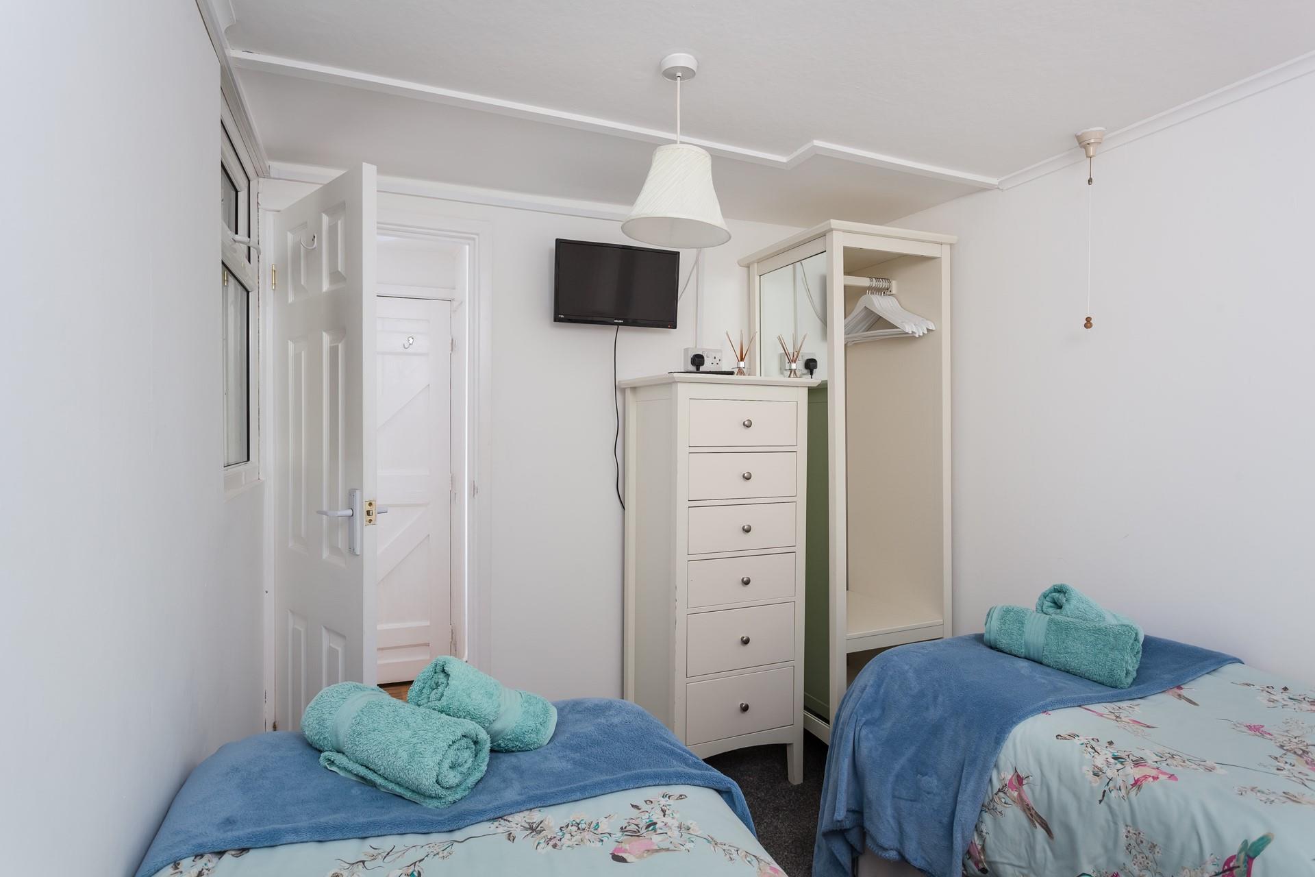 Watch the sun come down at Porthmeor and walk back to tuck into bed.