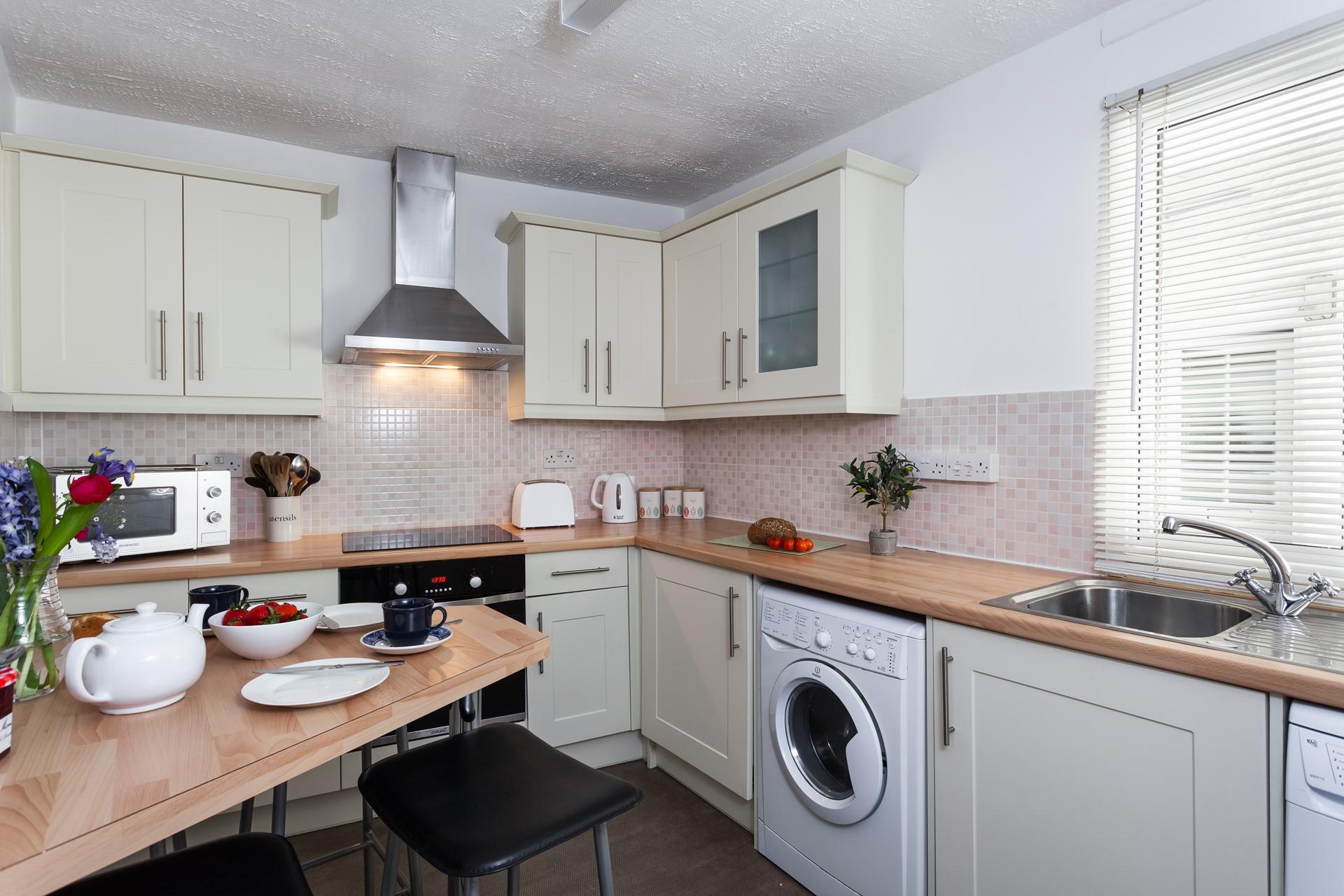 The kitchen is fully equipped for cooking up a storm for the whole family.