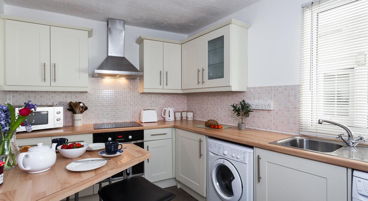 The kitchen is fully equipped for cooking up a storm for the whole family.