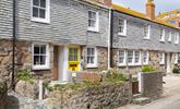 The cottage is on a quaint little street just steps from the shops in St Ives. - Thumbnail Image