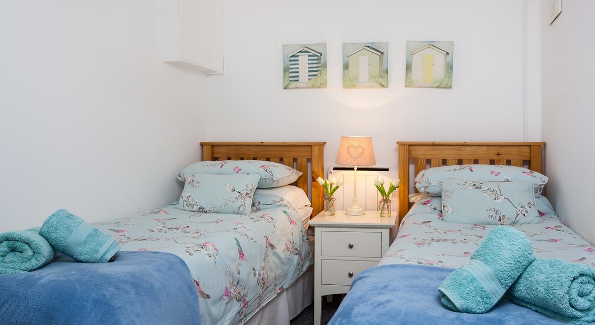 Bedroom 3 has twin beds perfect for children or young adults.