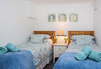 Bedroom 3 has twin beds perfect for children or young adults.