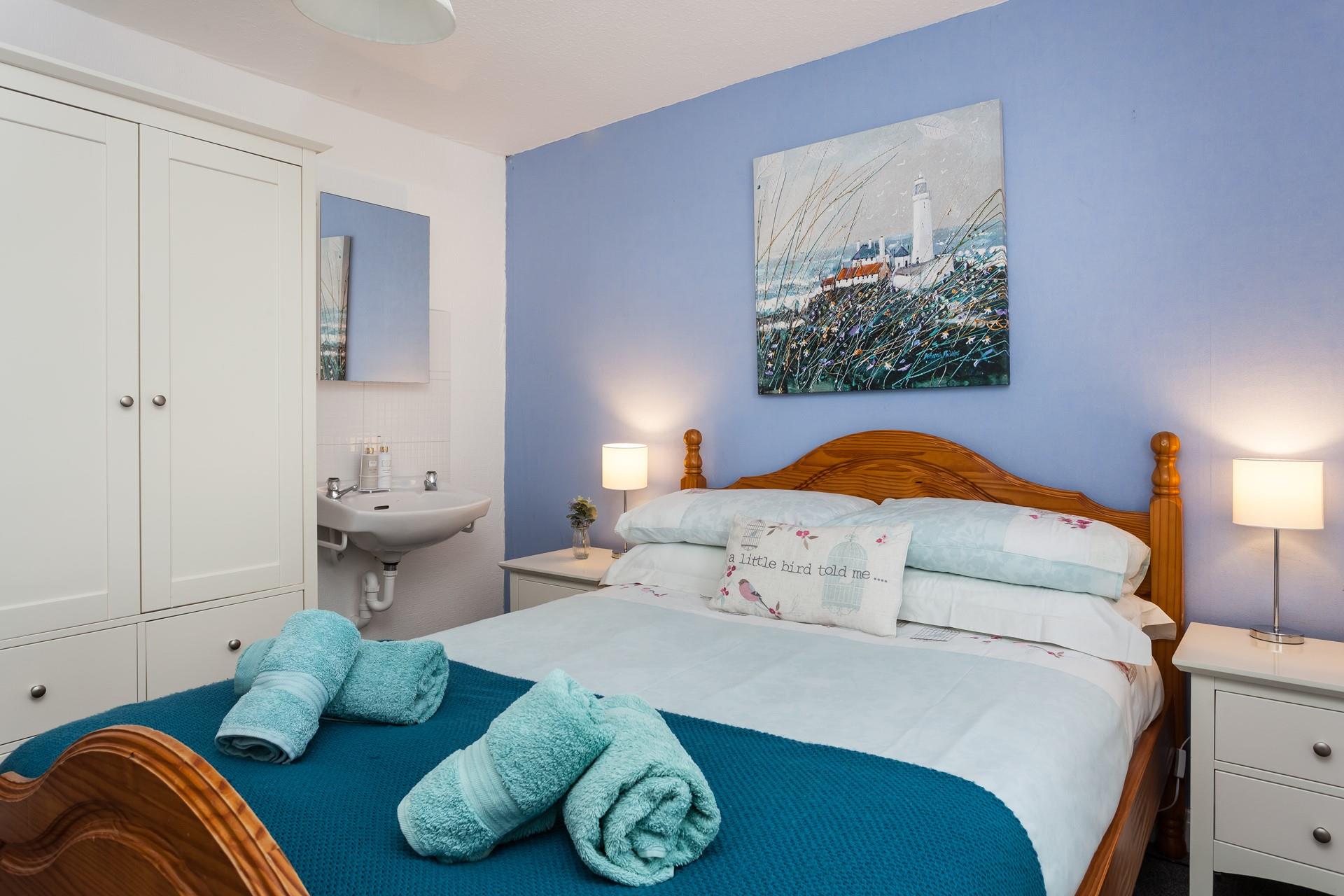 Settle into the double bed and drift into a peaceful night's sleep, dreaming of the next day's adventure.