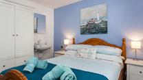 Settle into the double bed and drift into a peaceful night's sleep, dreaming of the next day's adventure.