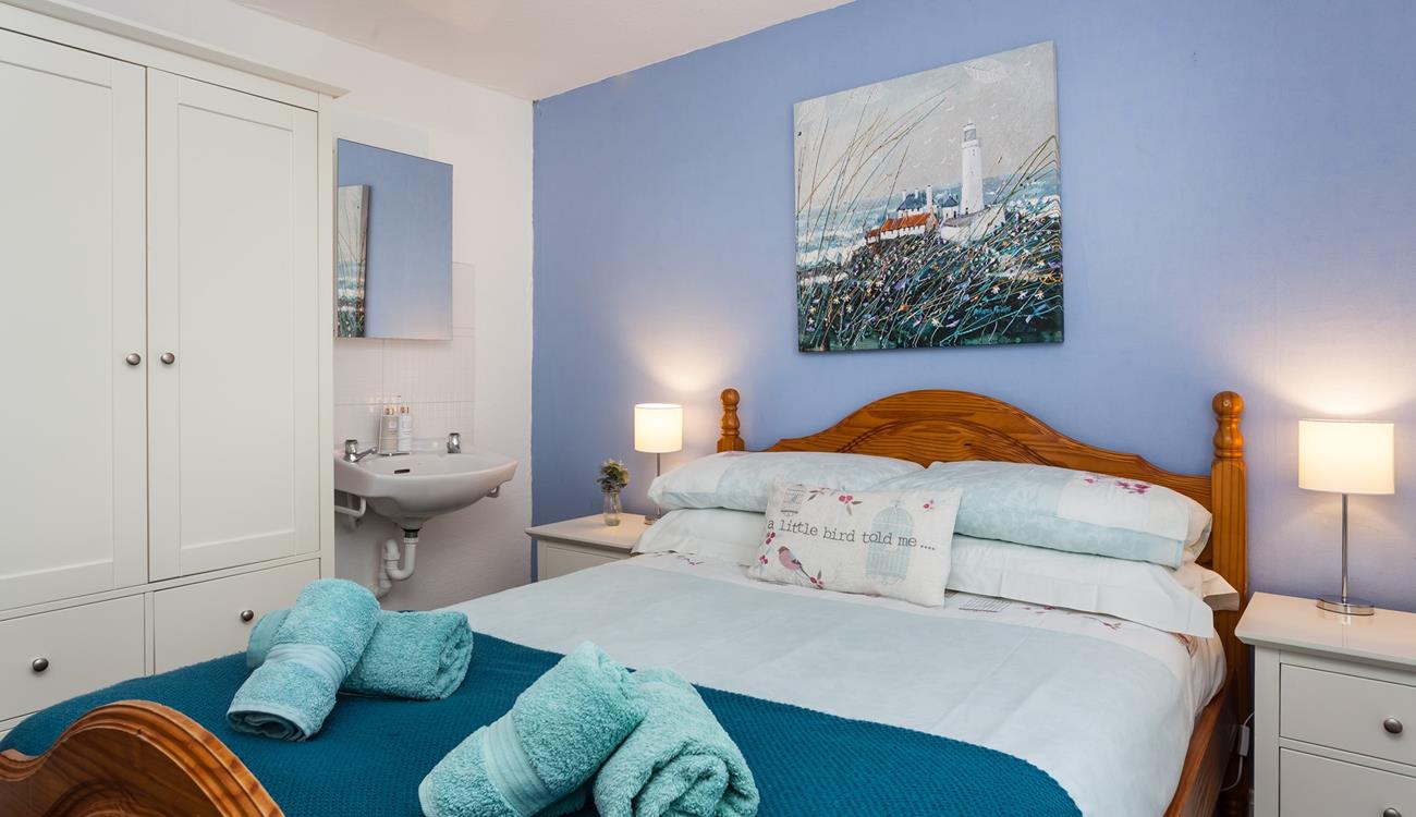 Settle into the double bed and drift into a peaceful night's sleep, dreaming of the next day's adventure.