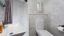 The bathroom provides the perfect space to get ready for the day.
