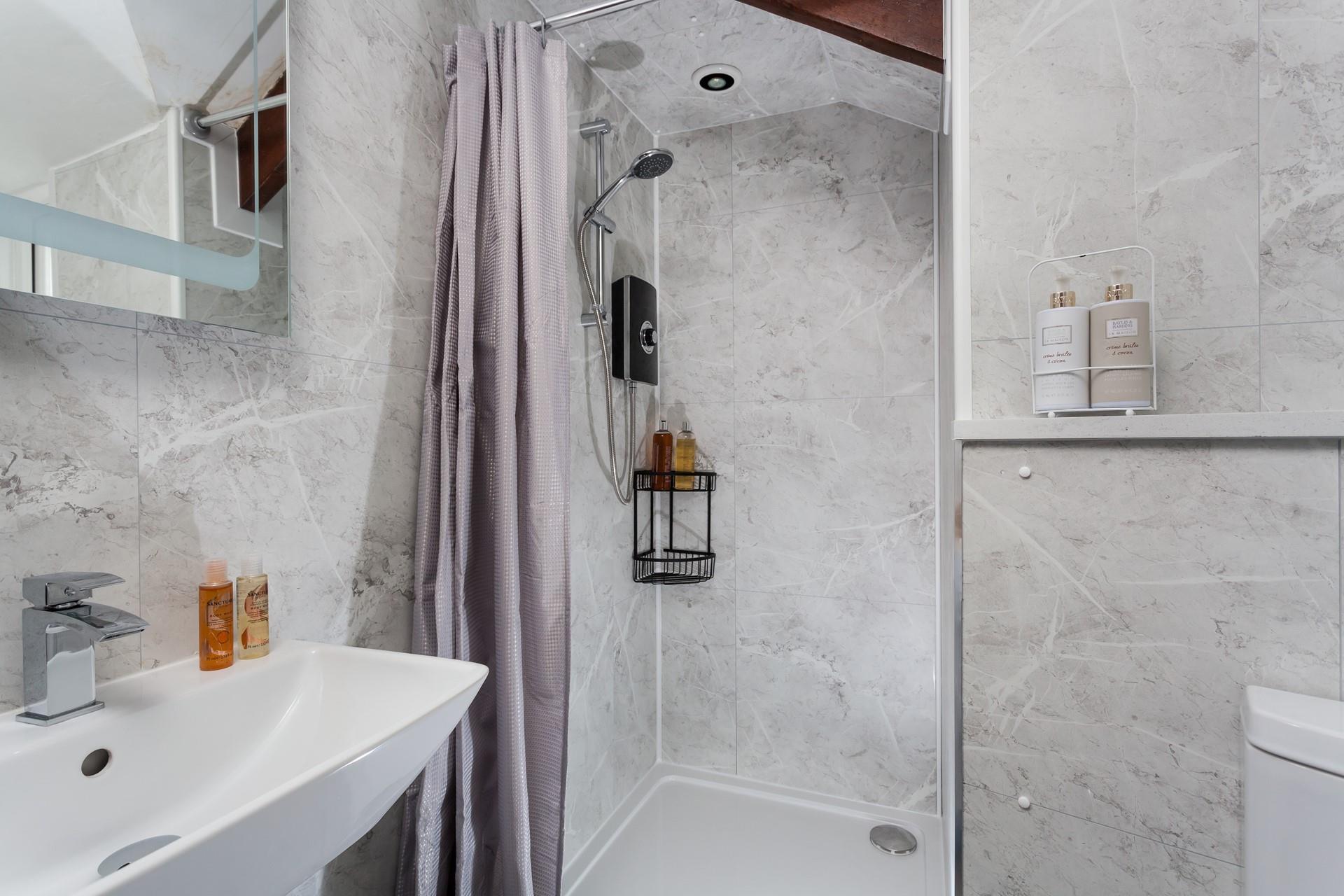 Wash off your sandy toes in the shower and get ready for an evening walk into town.