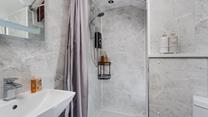 Wash off your sandy toes in the shower and get ready for an evening walk into town.
