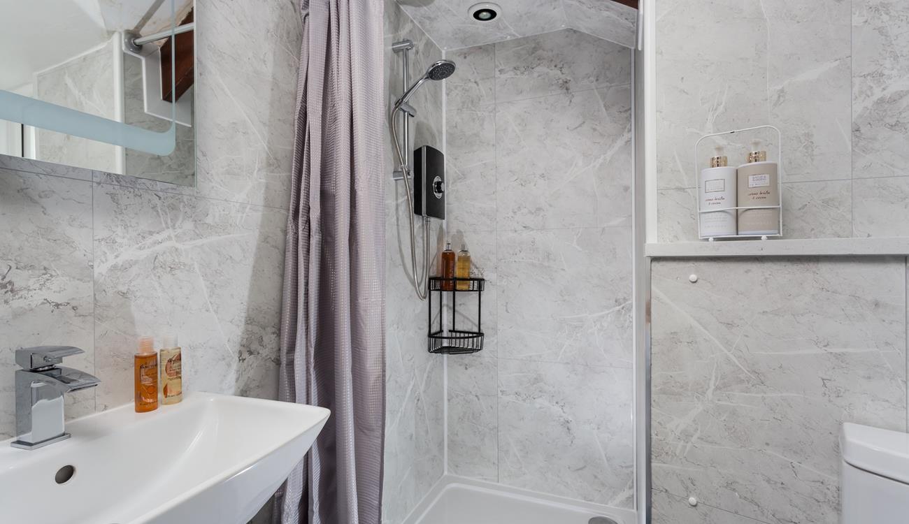 Wash off your sandy toes in the shower and get ready for an evening walk into town.