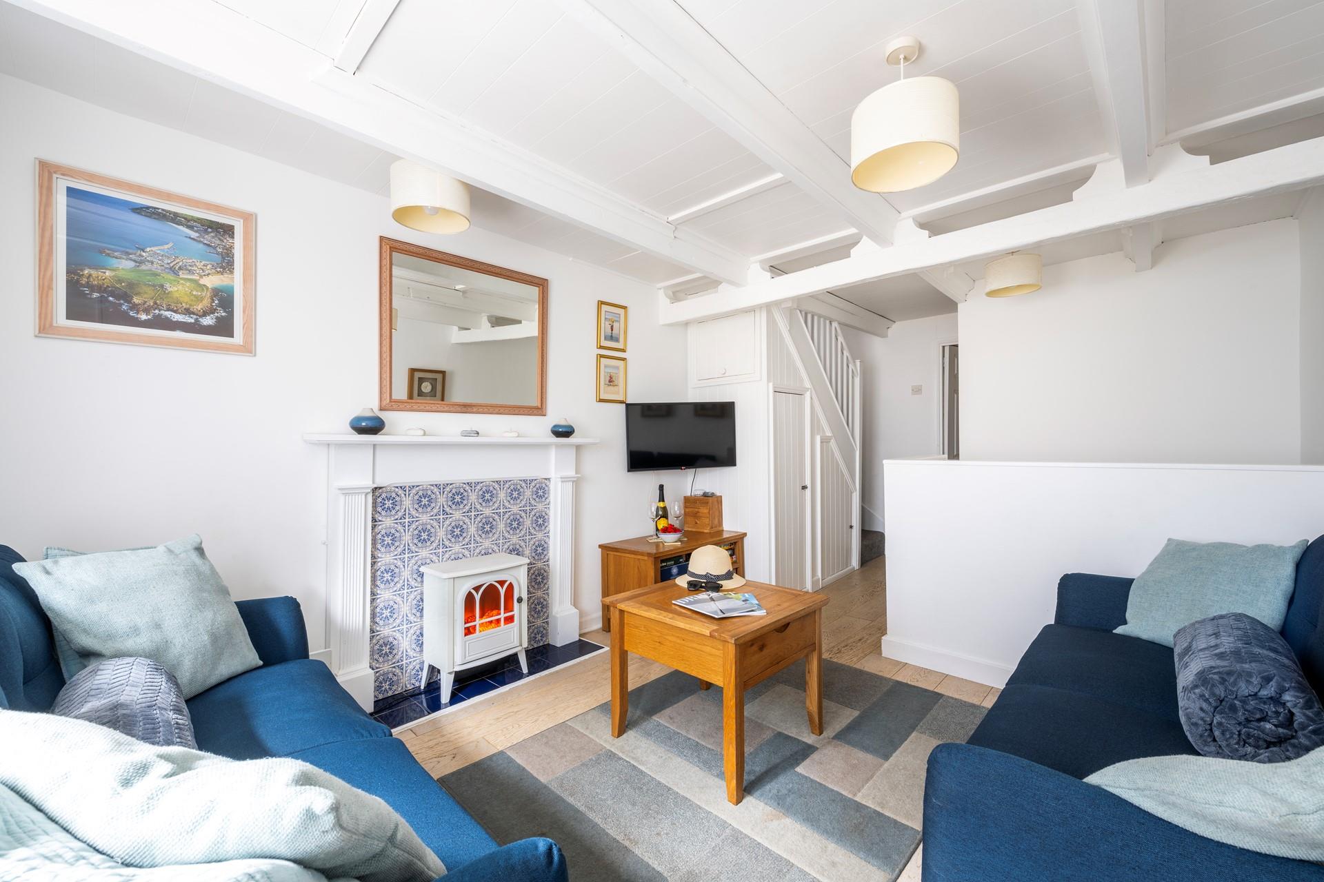 Light the electric fire and open a bottle of wine with a feel-good movie on the TV.