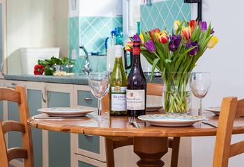 Enjoy a glass of wine in the open plan dining area after spending the day on the beach.