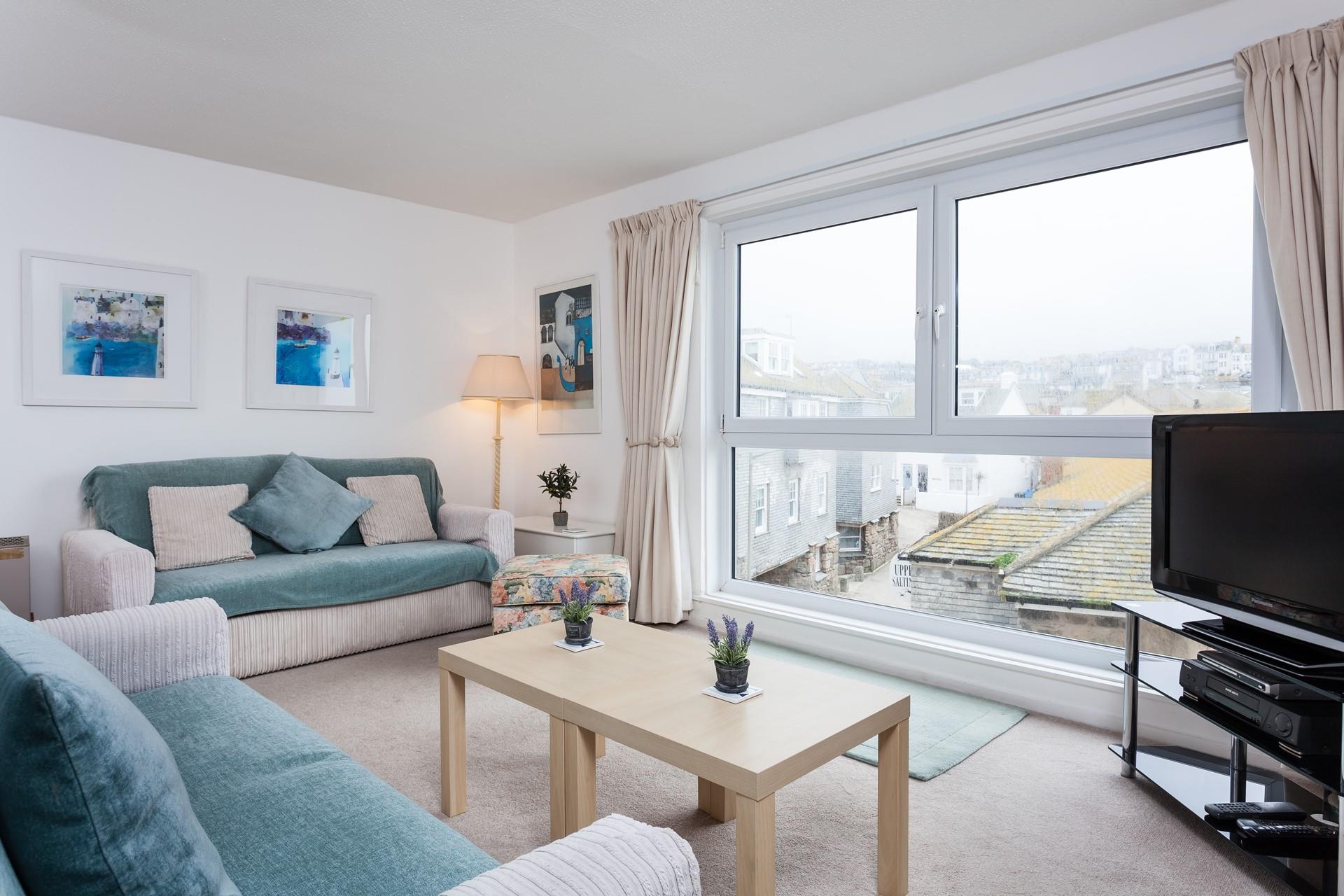 Decorated in calming tones, the sitting room provides the ideal place to relax and unwind away from the hustle and bustle of day to day life.