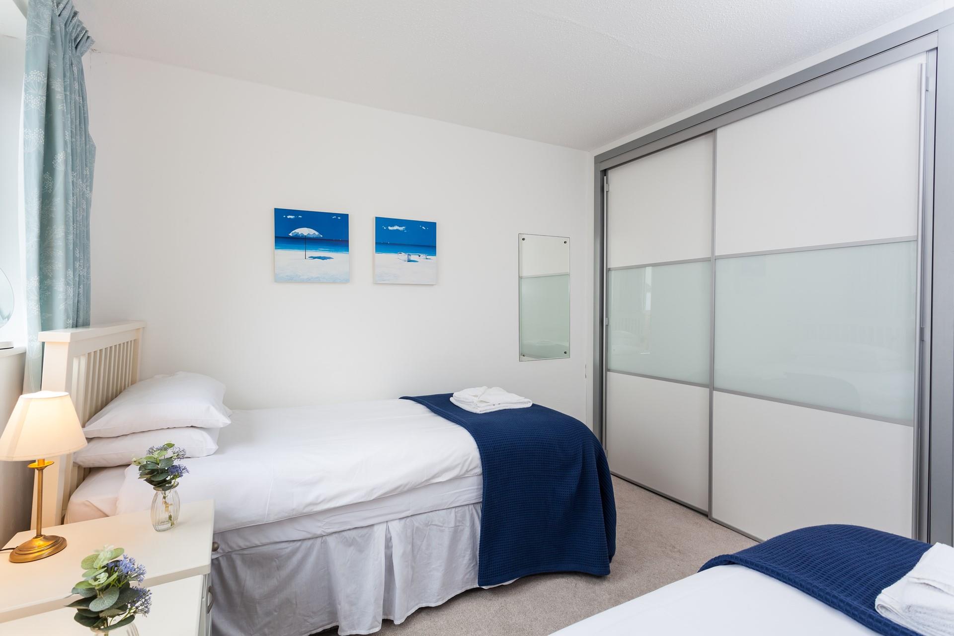 The bedroom has built-in fitted cupboards which offer excellent storage.