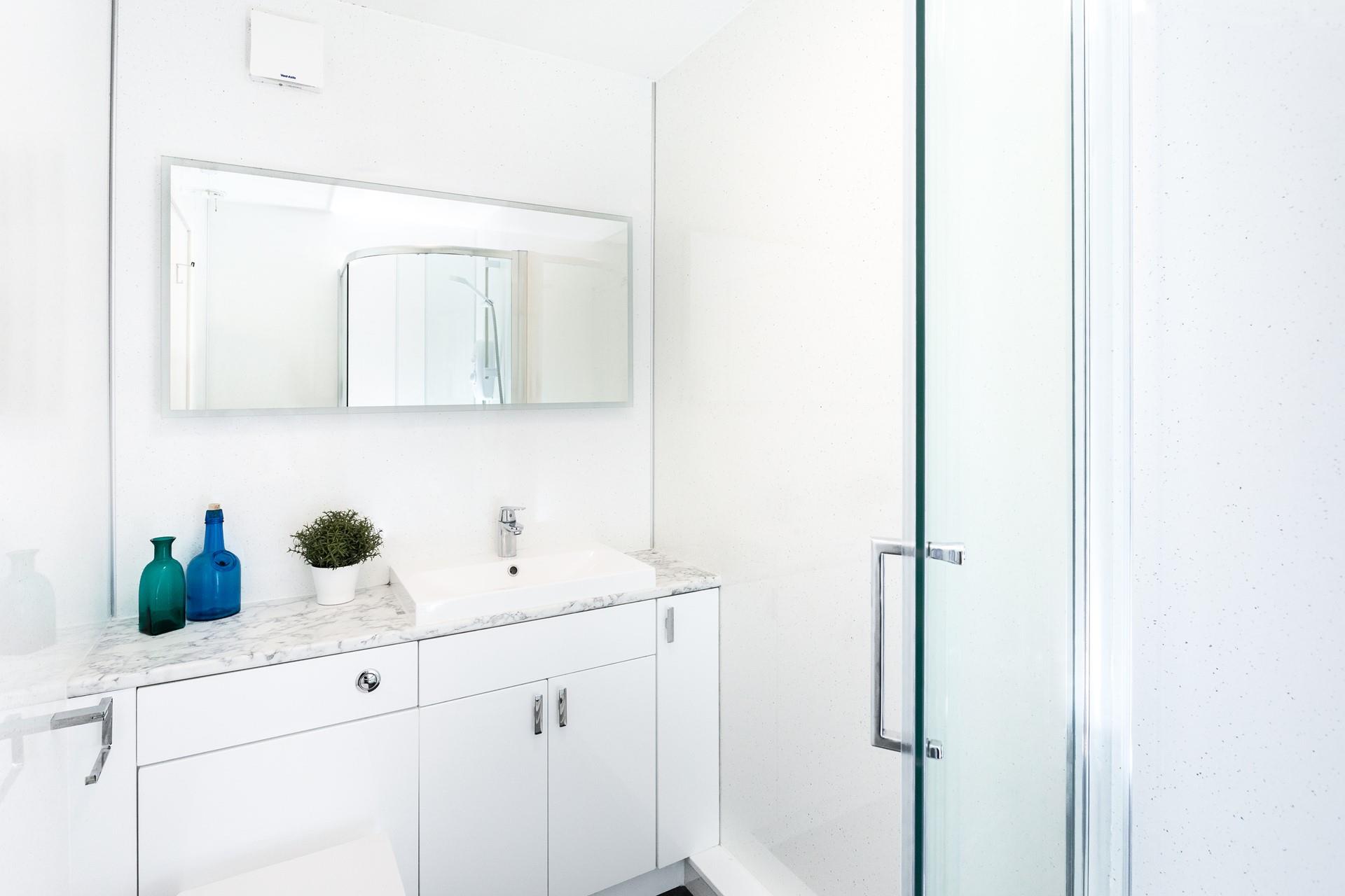 Get ready for the day in the modern bathroom.
