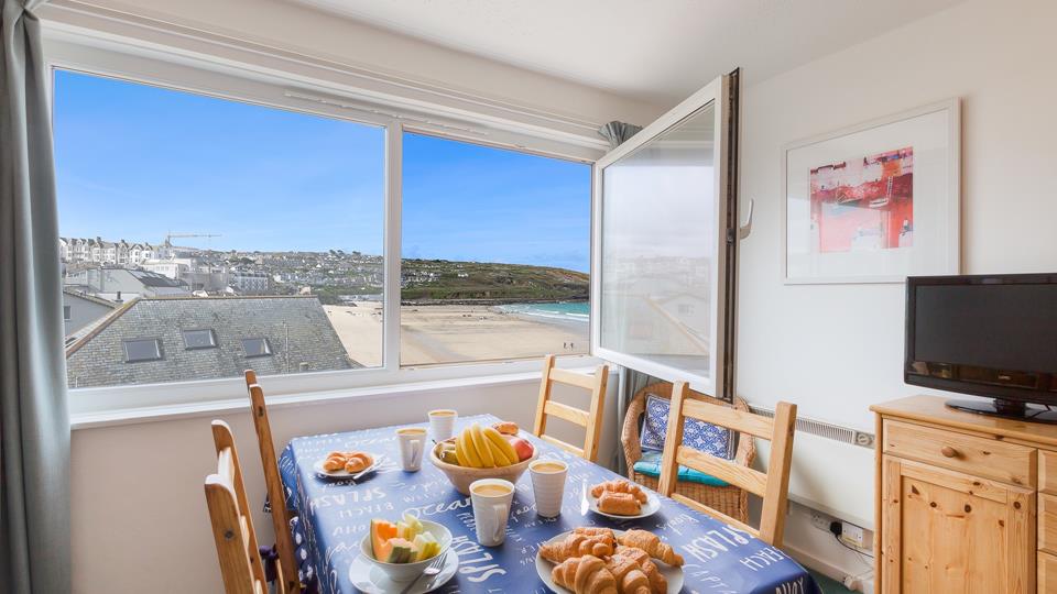 Open the window and let in the sounds of the seaside whilst you eat.