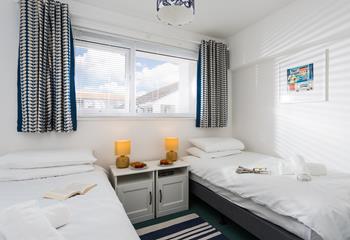 The twin bedroom is beautifully decorated and perfect for friends sharing.