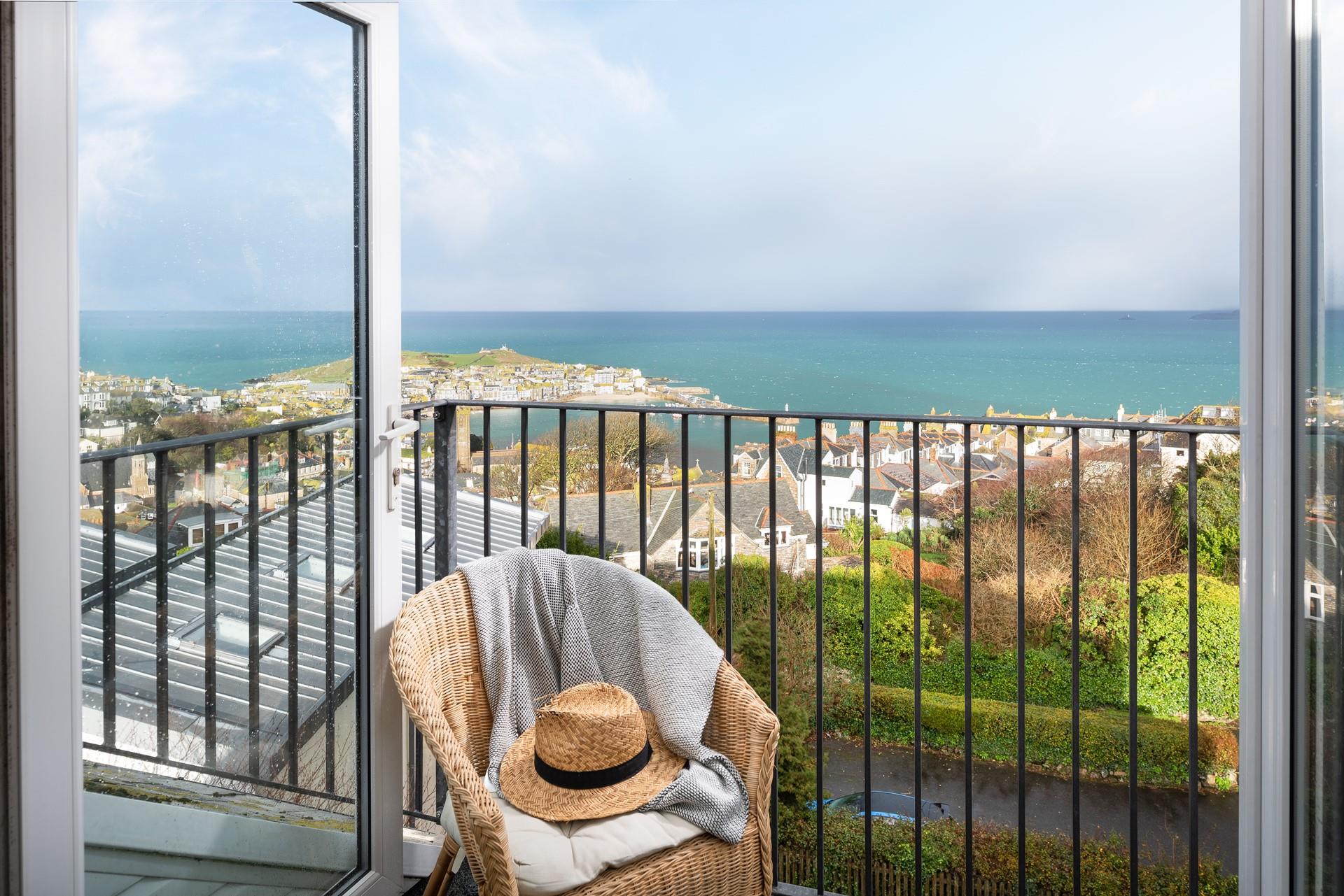 Relax with a glass of wine in front of the stunning views across the Bay.