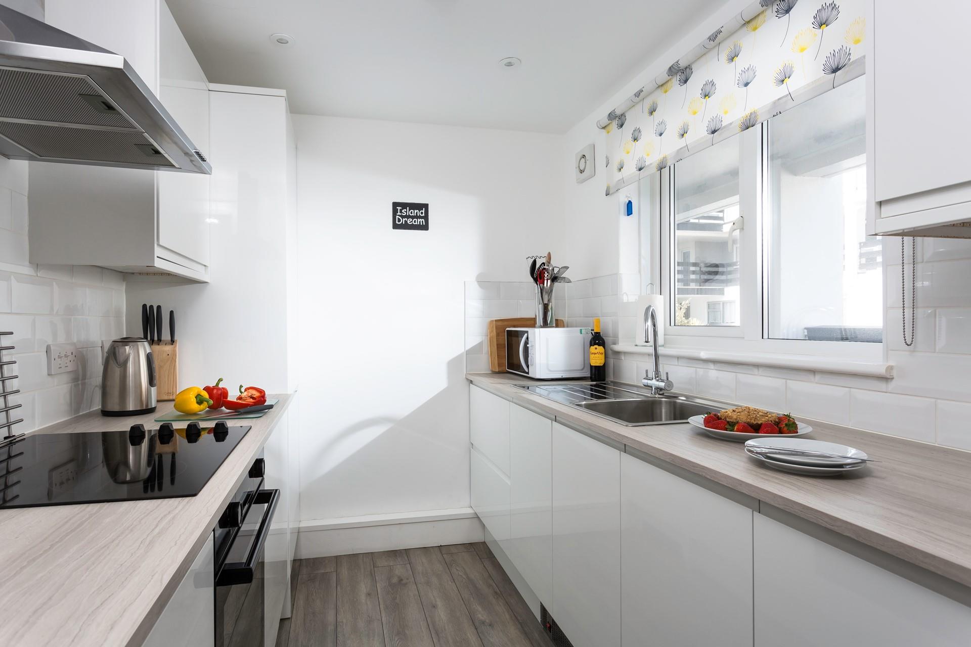 The well-equipped kitchen is perfect for cooking up family meals.