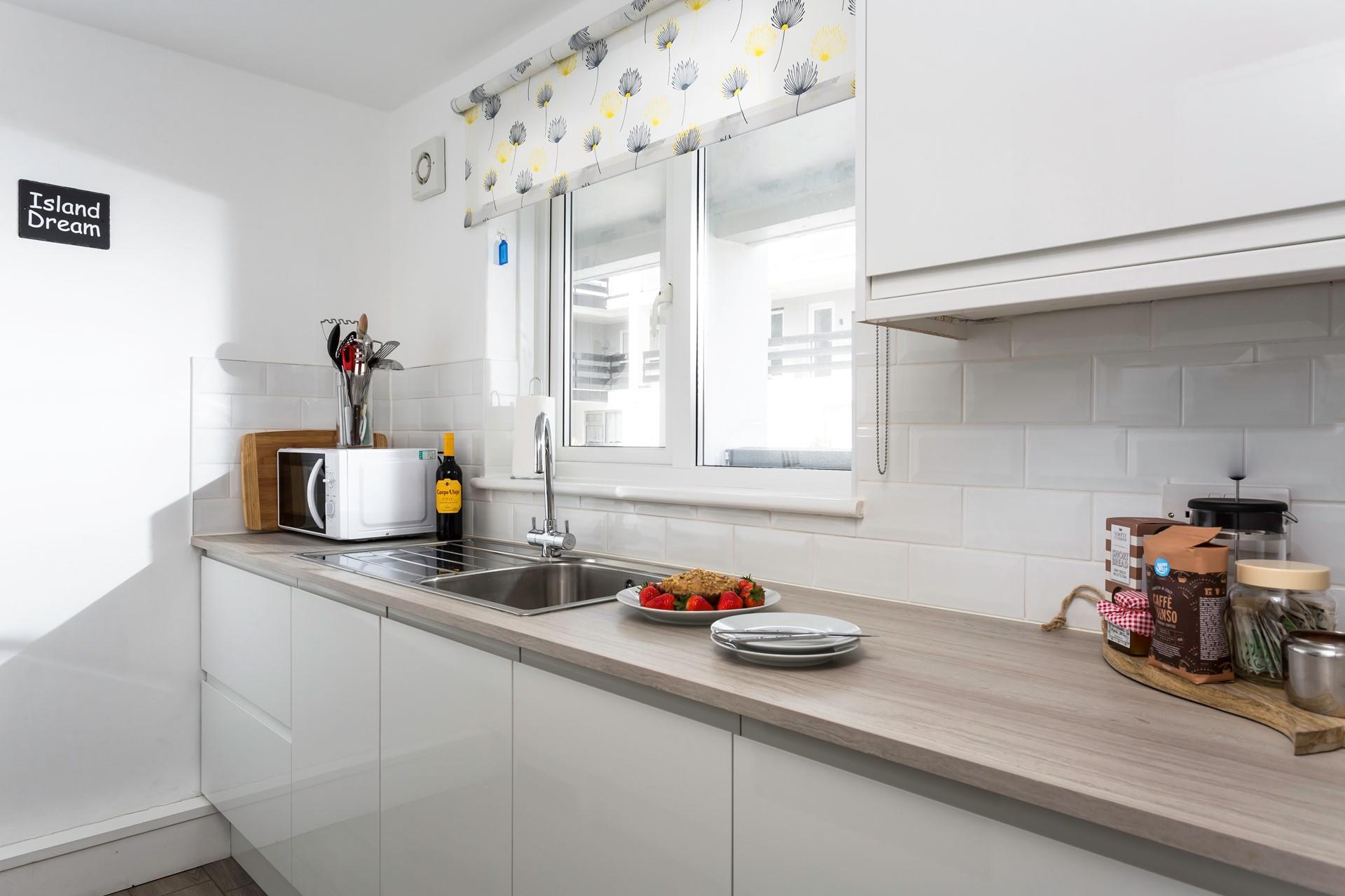 Light and bright, the kitchen has all you need.