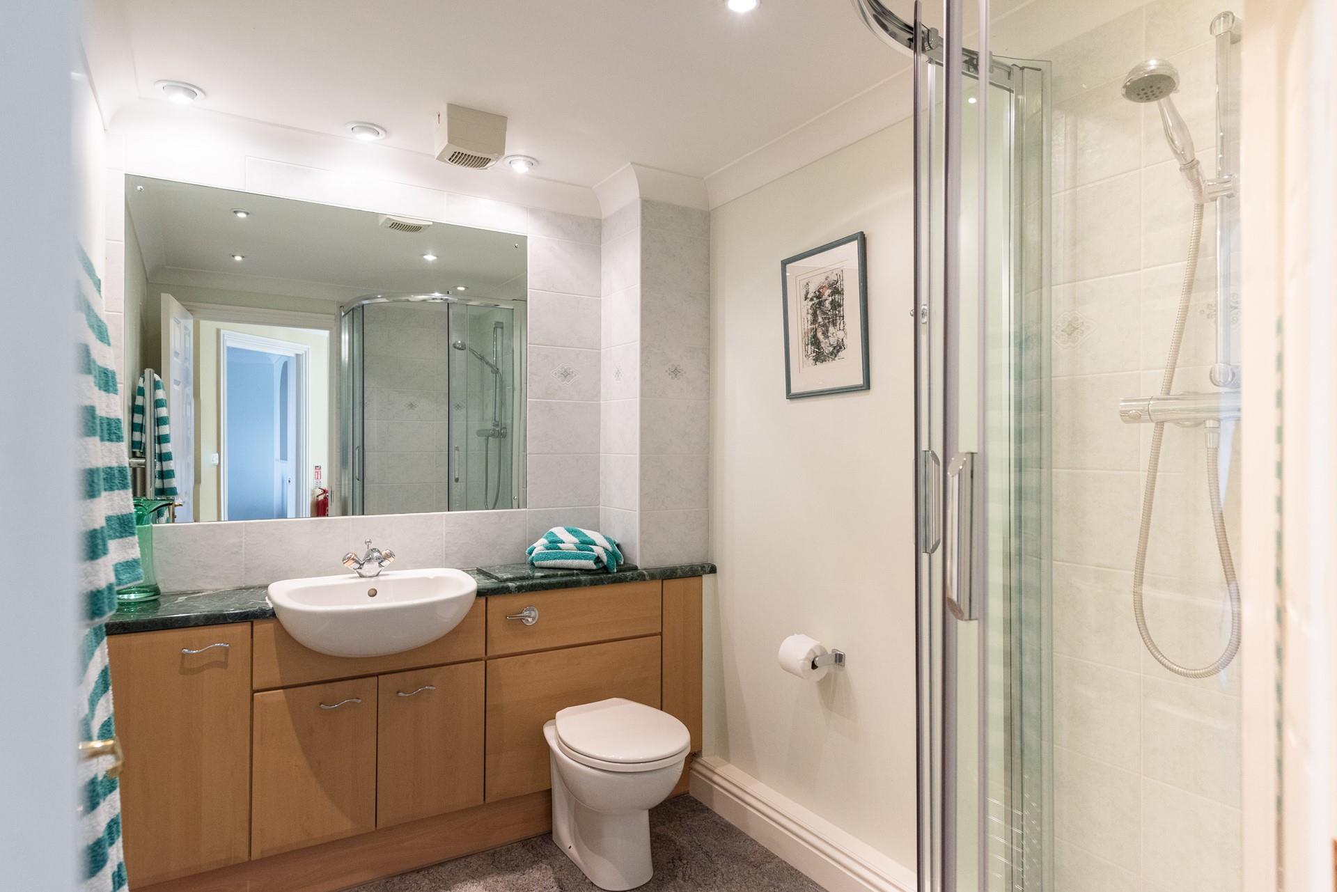 Wash off sandy toes in the shower after a day on Carbis Bay beach.