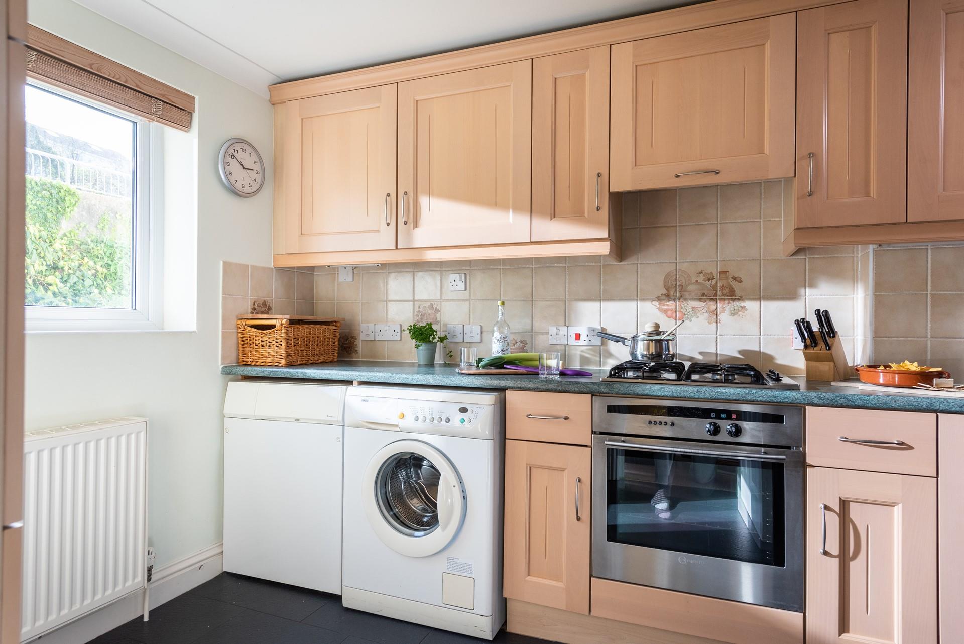 The kitchen is fully equipped with all the essentials to cook a tasty meal.
