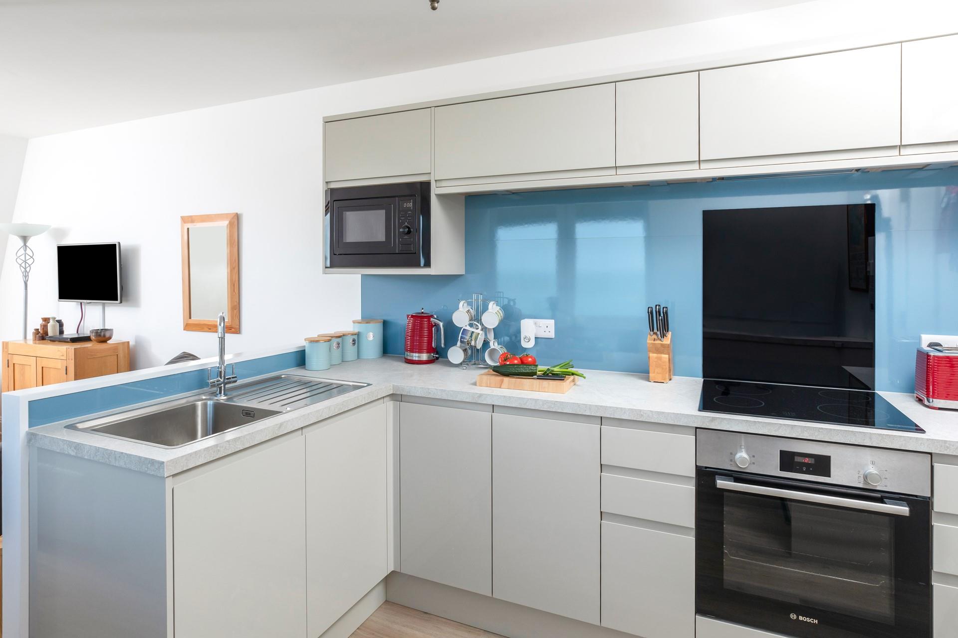 Prepare a hearty meal in the well-equipped kitchen.