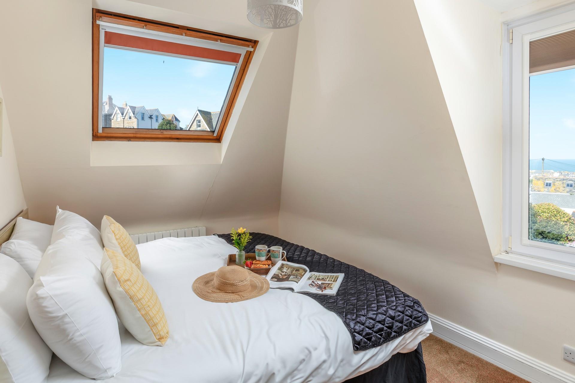 Draw the blinds wide and take your breakfast back to bed to enjoy the view whilst you eat.