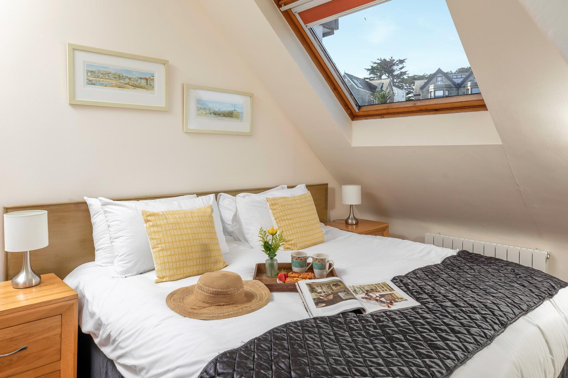 This gorgeous window allows you to look into the night and stargaze before bed.