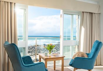 Sit back, relax and enjoy stunning sea views from your balcony with your favourite tipple.