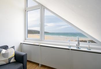 Watch the waves roll onto the beach from the comfort of the sitting room.