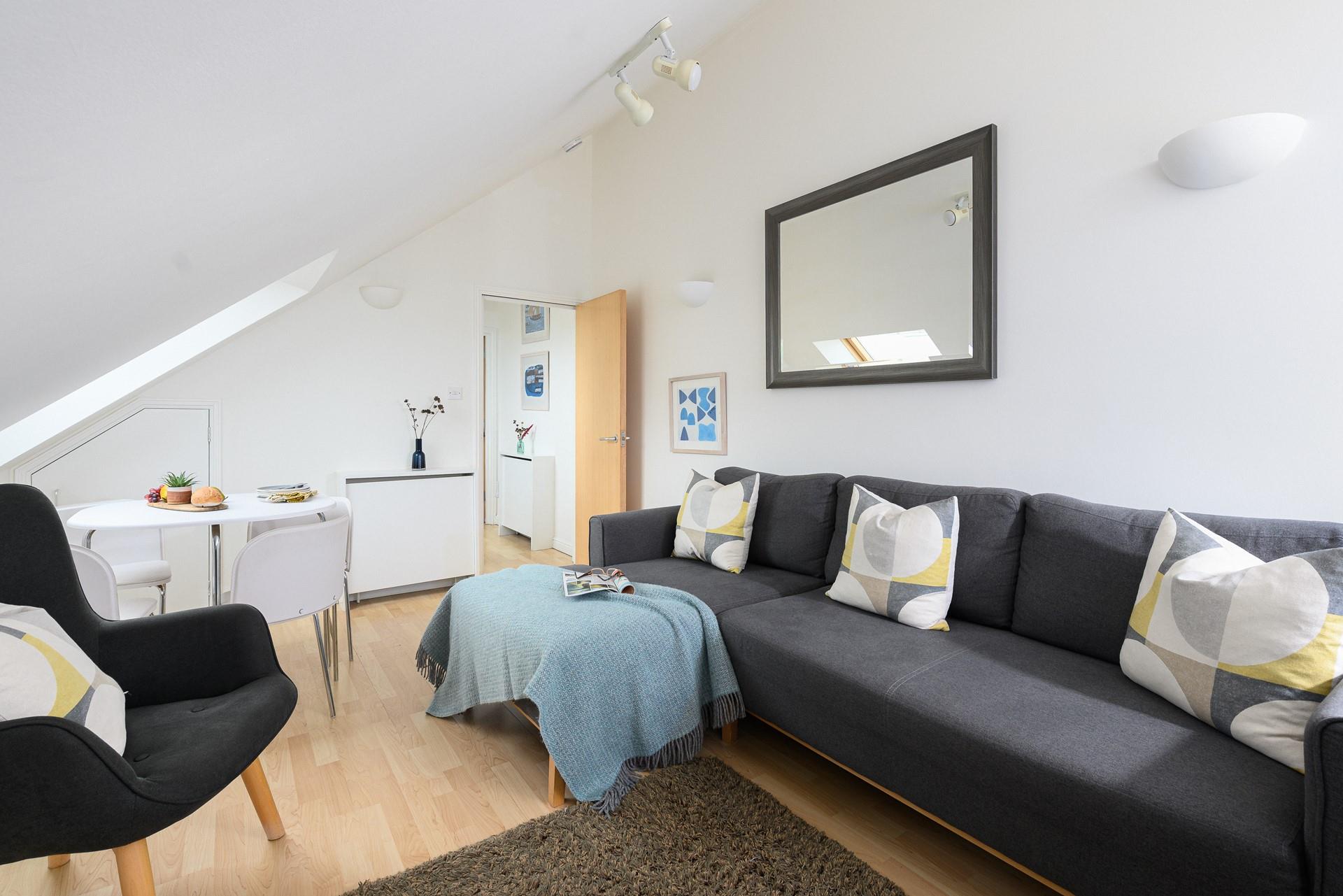 Relax in the sitting room after a memorable day on the beach.