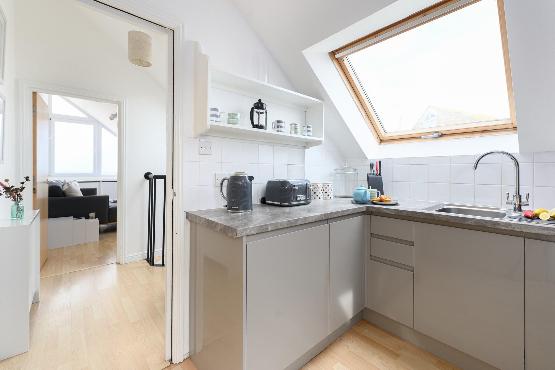 The kitchen is well-equipped for cooking up tasty meals.