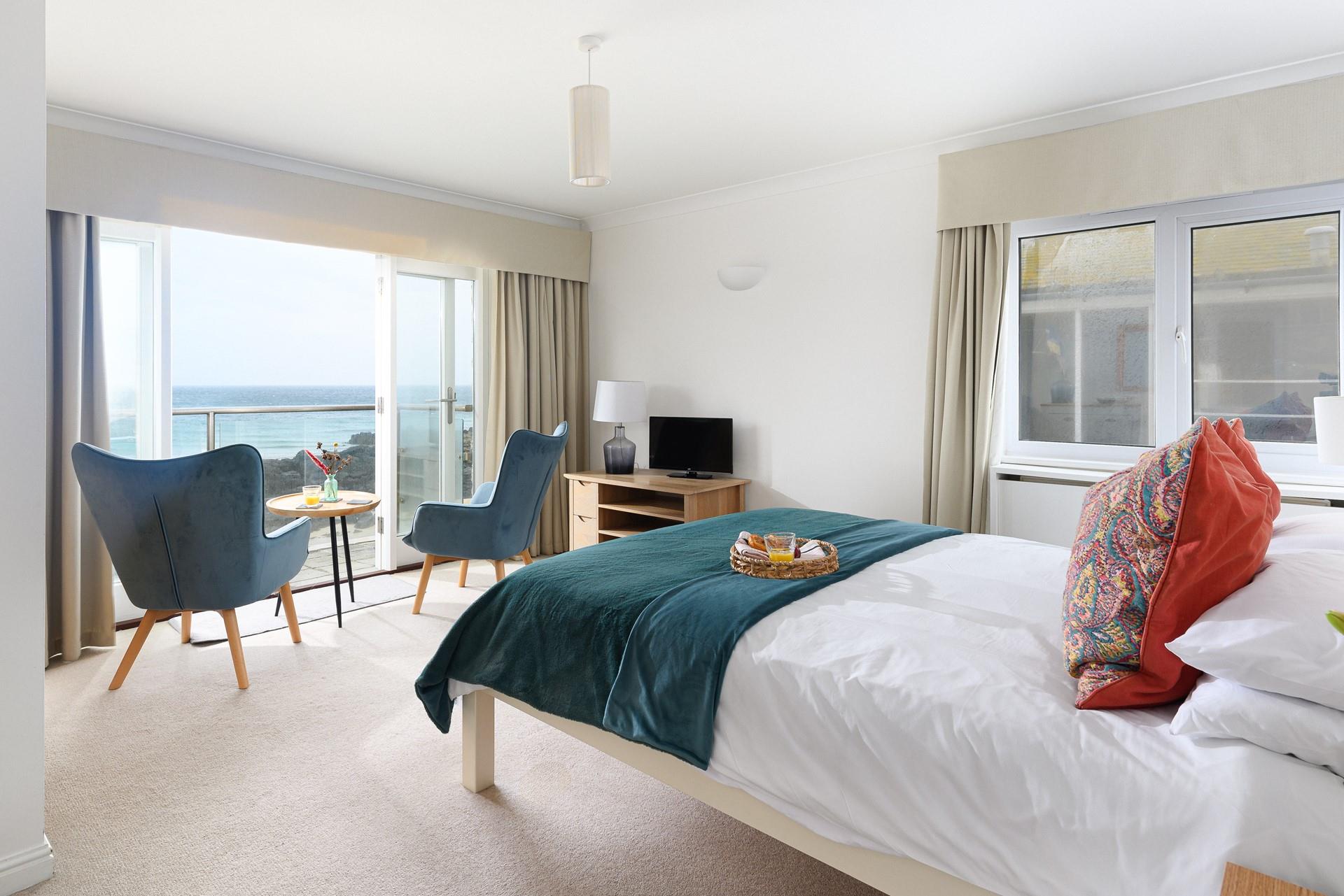 The double bedroom is spacious and light, the perfect base for your staycation.