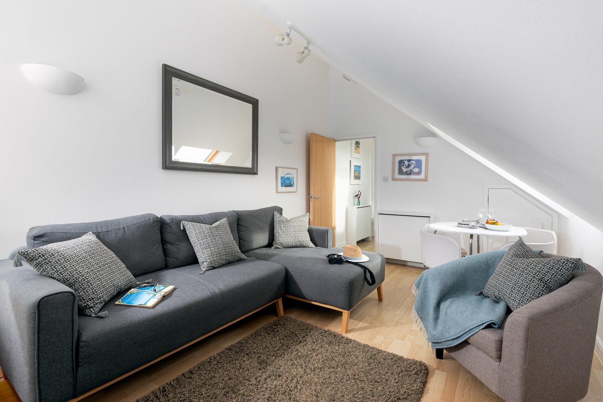 Snuggle up on the sofa and catch up on your favourite shows on your smart TV, all whilst glancing out at the ocean.