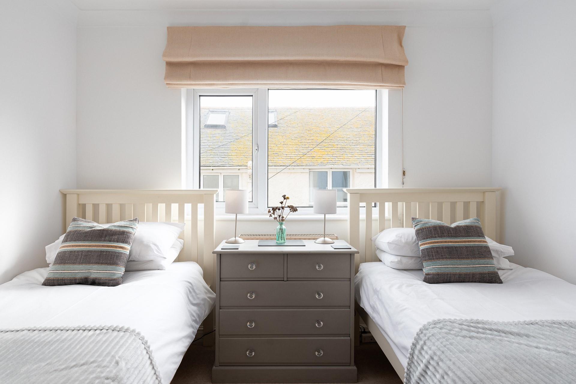 The twin room is perfect for children to get a dreamy night's sleep after a busy beach day.