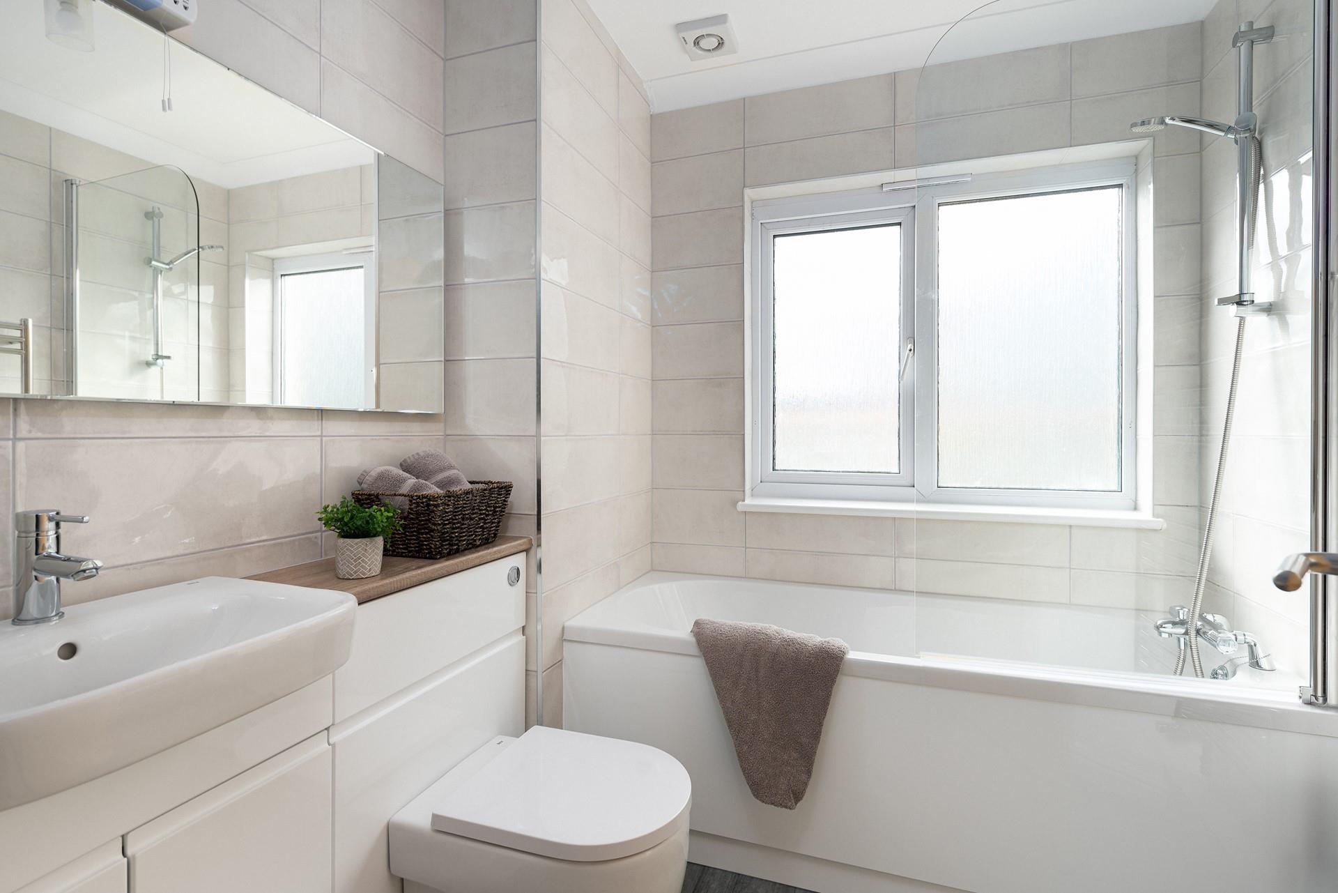 Wash off sandy toes in the shower after a day on the beach.