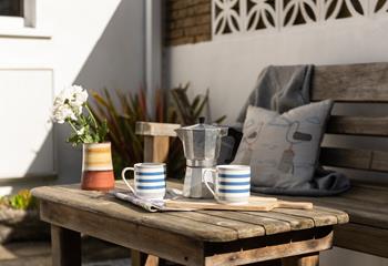 The rear patio is the perfect sun trap, offering a tucked-away space to enjoy a generous mug of coffee.