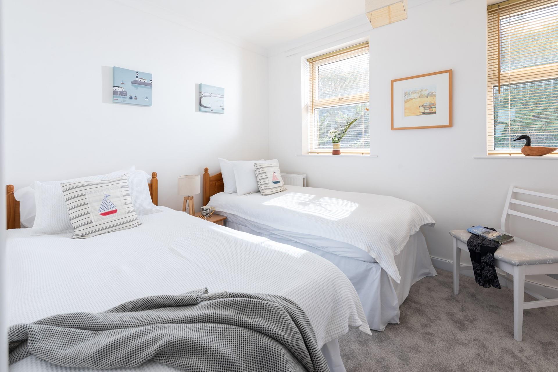 Seating in the twin room is perfect for adults to read bedtime stories for children!