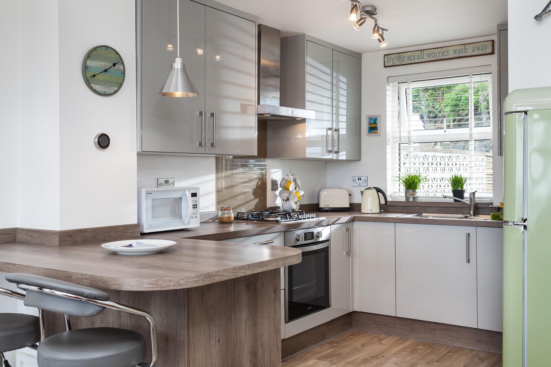 The modern kitchen is a great space to rustle up dinner. 