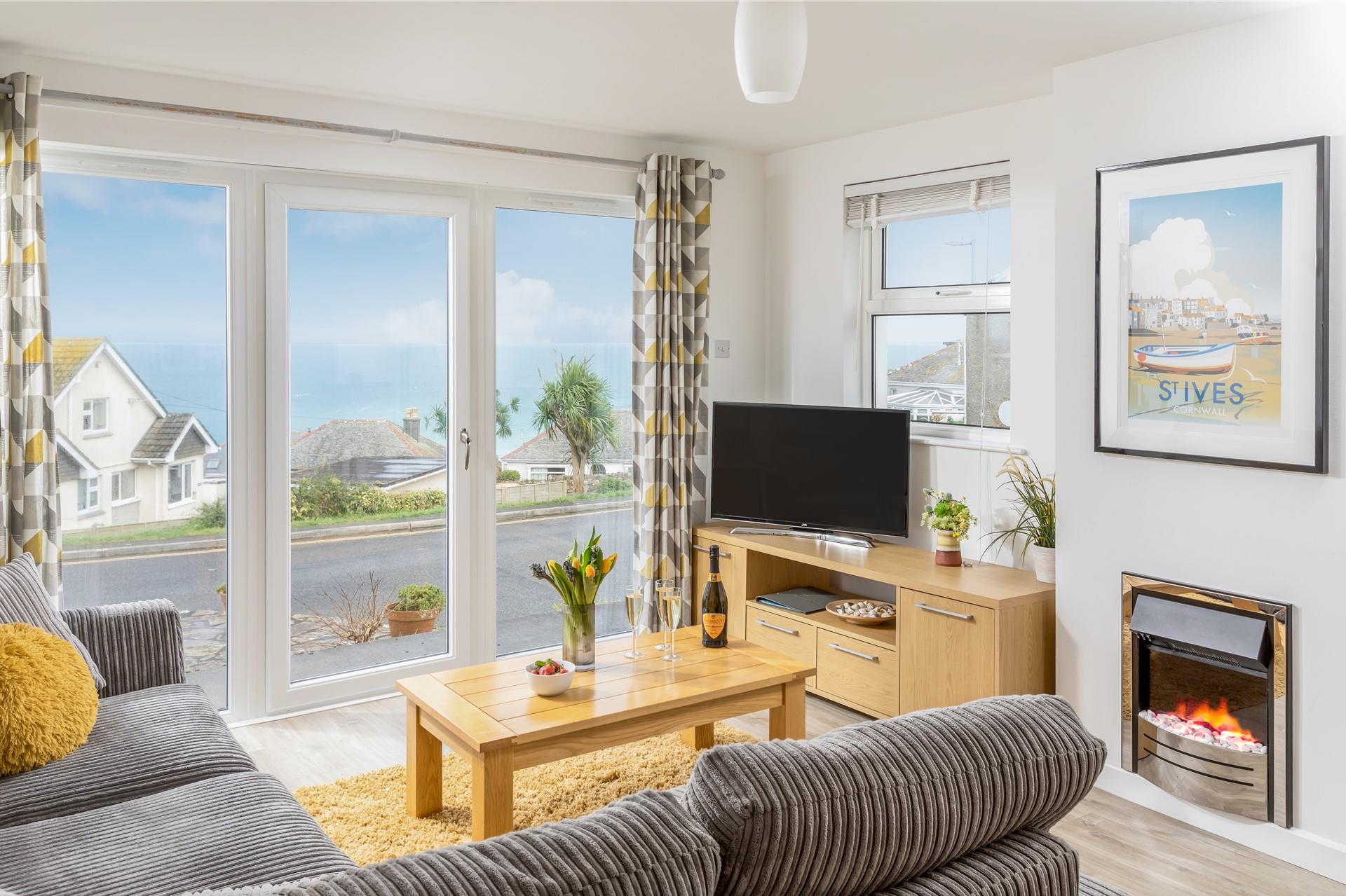 Sit back on your comfy sofa and stare out to sea.