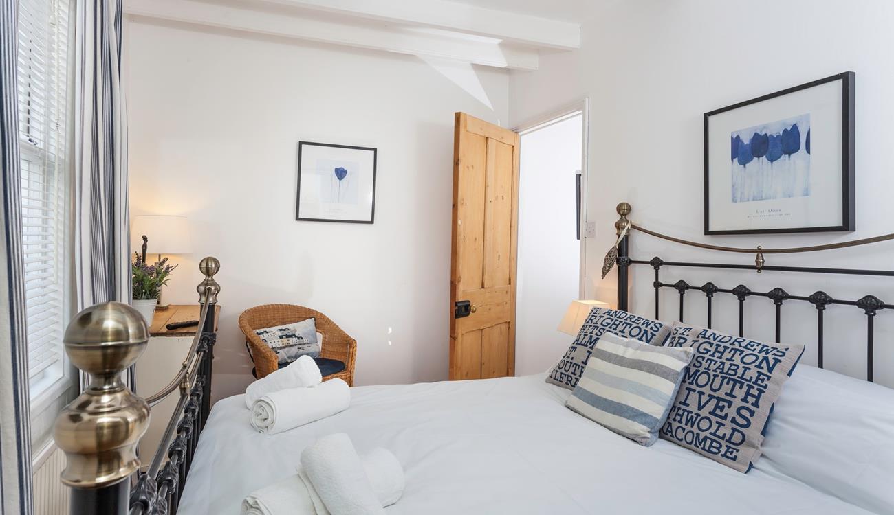 A sumptuous double bed and peaceful location promise a blissful night's sleep.